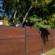 Modern Composite Horizontal Privacy Fence with Aluminum Posts and Rails