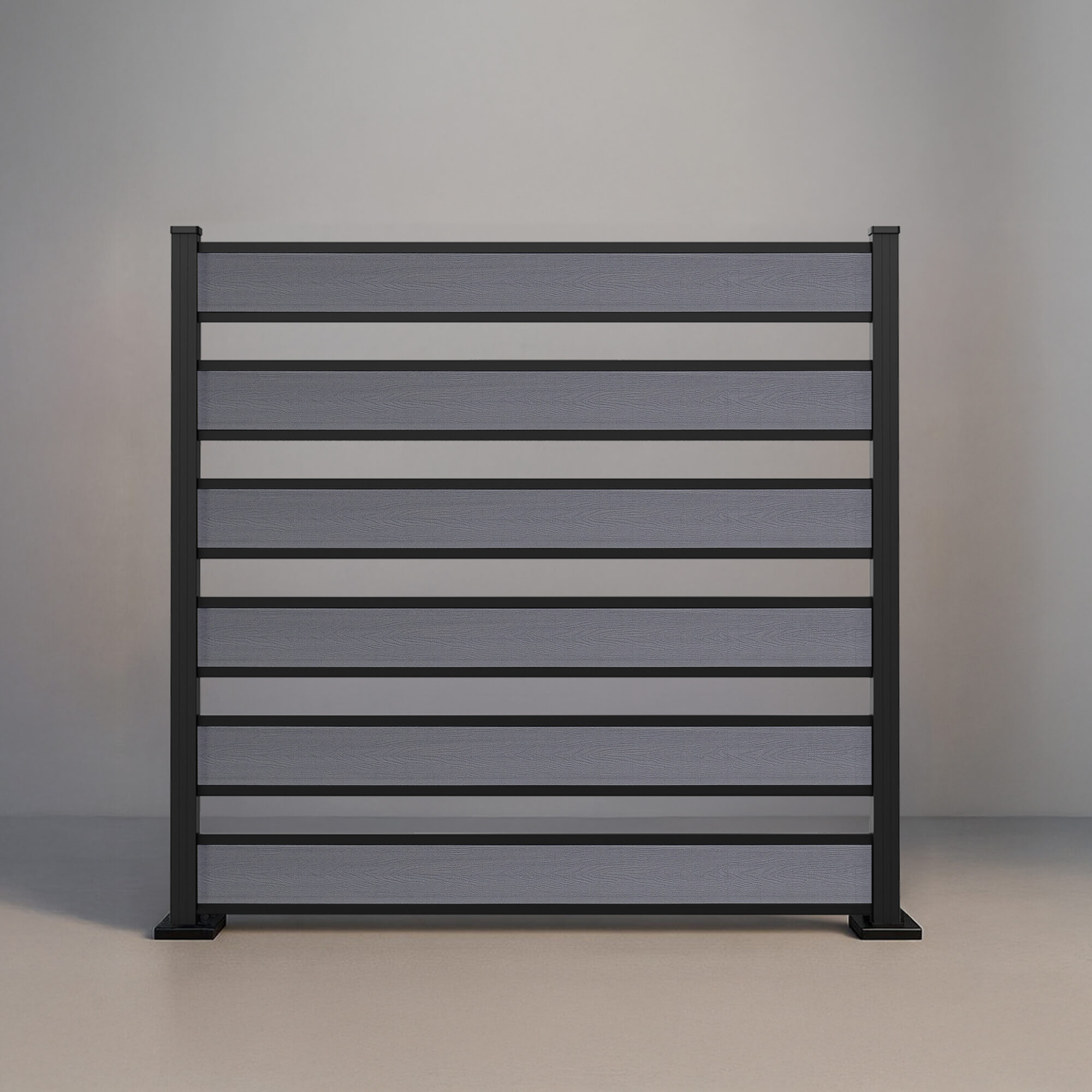 GWF® Horizontal Picket composite fence in Storm Grey, six tongue-and-groove boards with open 4 inch spacing on a 6063-T5 aluminum frame.