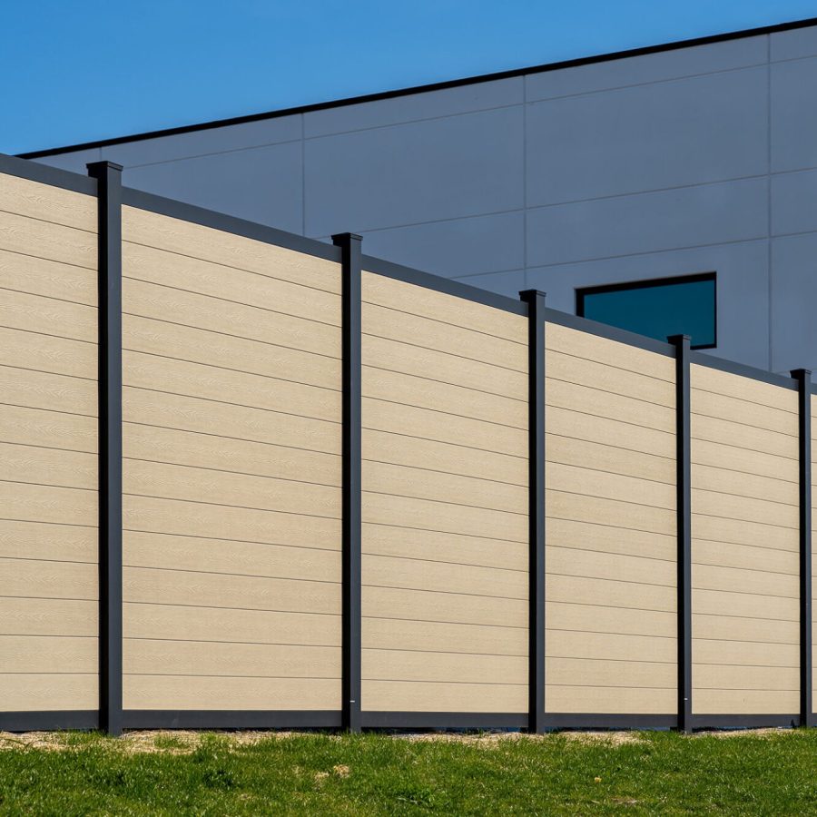Greenwood Fence Elite Privacy composite fence in Sandy Birch at a commercial property