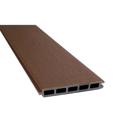 Greenwood Fence Aspen Brown capped composite fence board with woodgrain surface, tongue-and-groove edge, and five chamber hollow profile