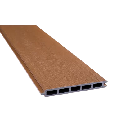 Greenwood Fence Cedar capped composite fence board with woodgrain surface, tongue-and-groove edge, and five-chamber hollow profile