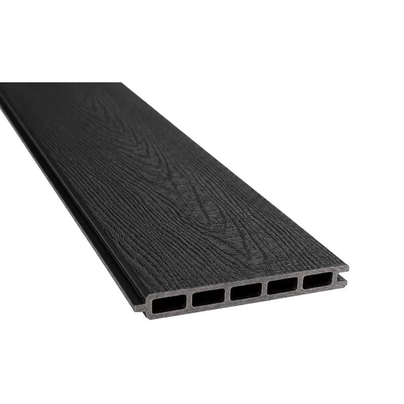 Greenwood Fence Charcoal capped composite fence board with woodgrain surface, tongue-and-groove edge, and five-chamber hollow profile