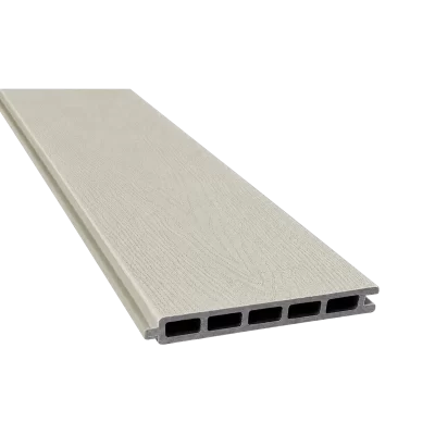 Greenwood Fence Sandy Birch capped composite fence board with woodgrain surface, tongue-and-groove edge, and five-chamber hollow profile